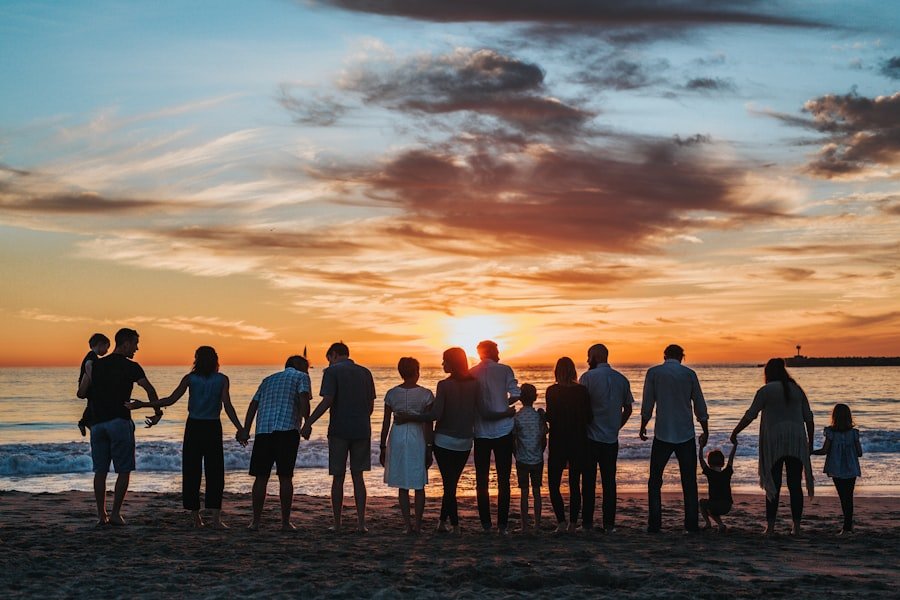 A family together on an Australian beach at sunset